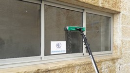 ניקוי חלונות בגובה באוסמוזה 