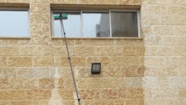 ניקוי חלונות בגובה באוסמוזה 