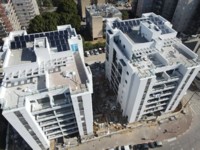 סיום שני בנינים  לאחר חיזוק הבניין  